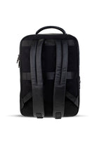 Black backpack with textured leather straps and a sleek, minimalist design.