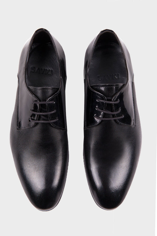 Black patent leather and textured black leather oxford shoes with a sleek, polished finish.