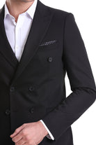 Black double-breasted suit jacket with subtle black polka dot pocket square and matching studded buttons for smart casual wear