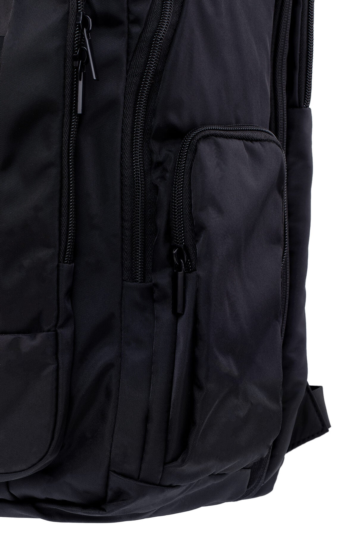 Black nylon backpack with multiple zippered compartments and a sleek, minimalist design.