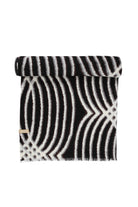 Black and white striped scarf with a geometric pattern, featuring frayed edges.