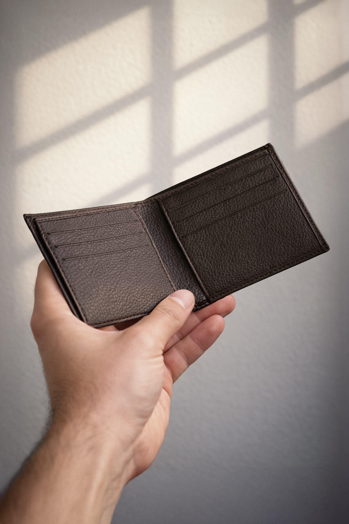 Dark brown leather wallet with textured surface and multiple card slots genuine leather brown wallet