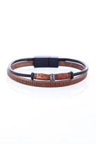 Brown leather bracelet with black magnetic clasp and silver-toned accent bead.