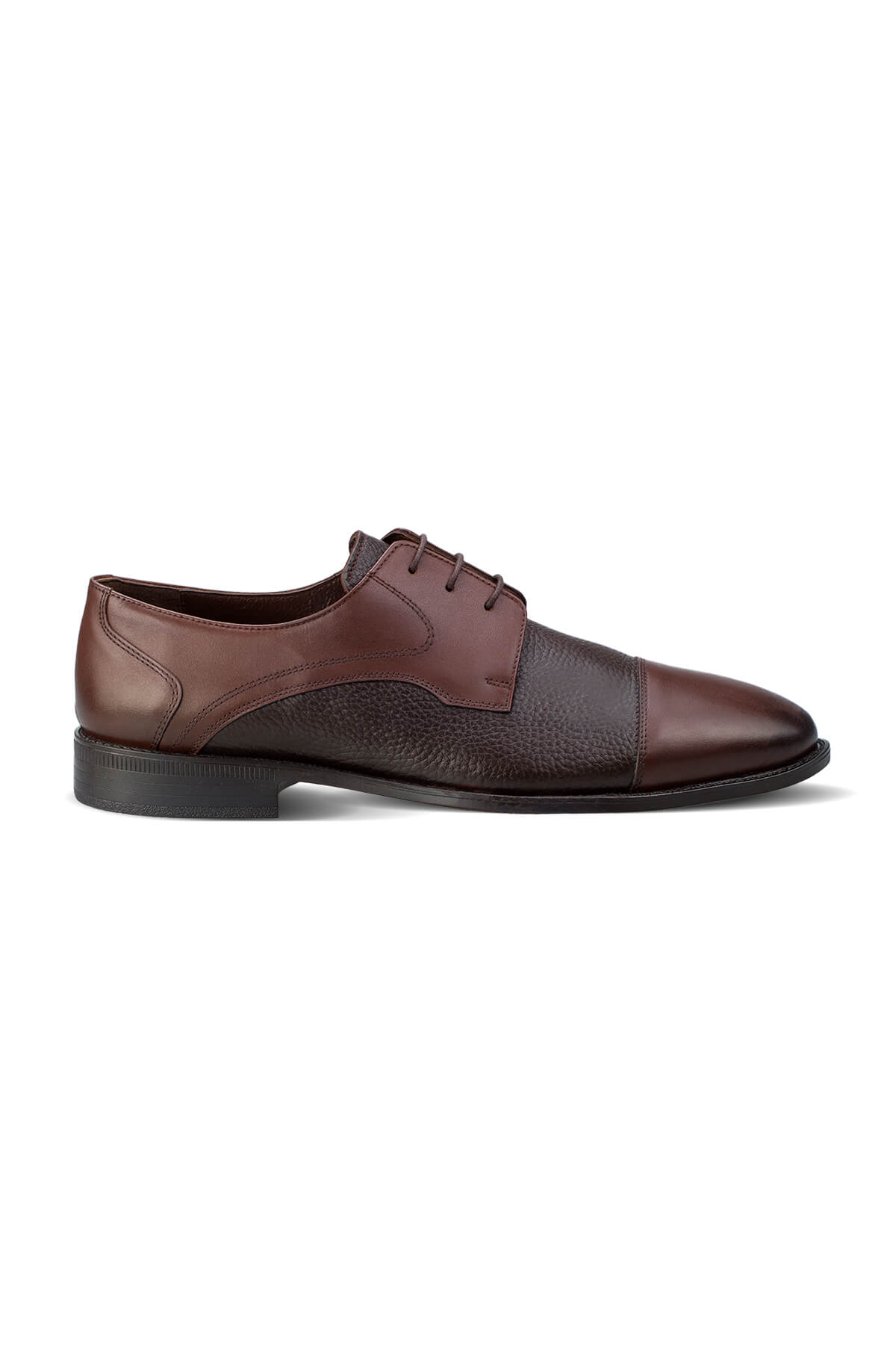 Brown leather oxford shoe with a two-tone design featuring a smoother upper and textured toe cap.