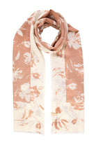 A soft peach and cream floral-patterned scarf with a delicate, lightweight fabric.