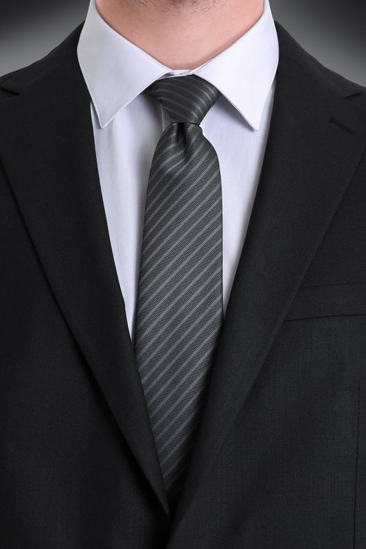 A sleek black tie with subtle diagonal gray stripes, crafted from a smooth, textured fabric.