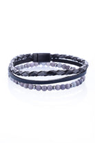 Black and gray braided leather bracelet with magnetic clasp.