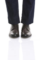 Black leather lace-up dress shoes with a polished finish and classic design.