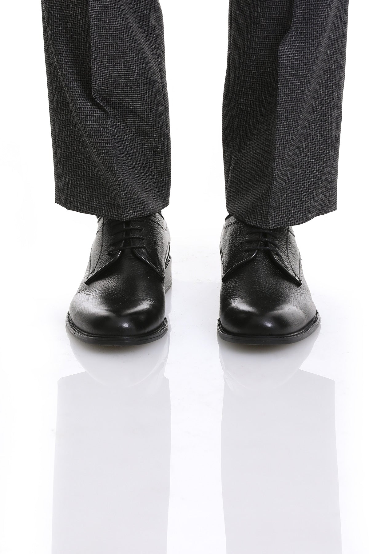 Black leather dress shoes with a polished finish and classic lace-up design.