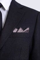 A sleek black suit jacket with a classic sateen solid lavender pocket square featuring a silver-tone finish