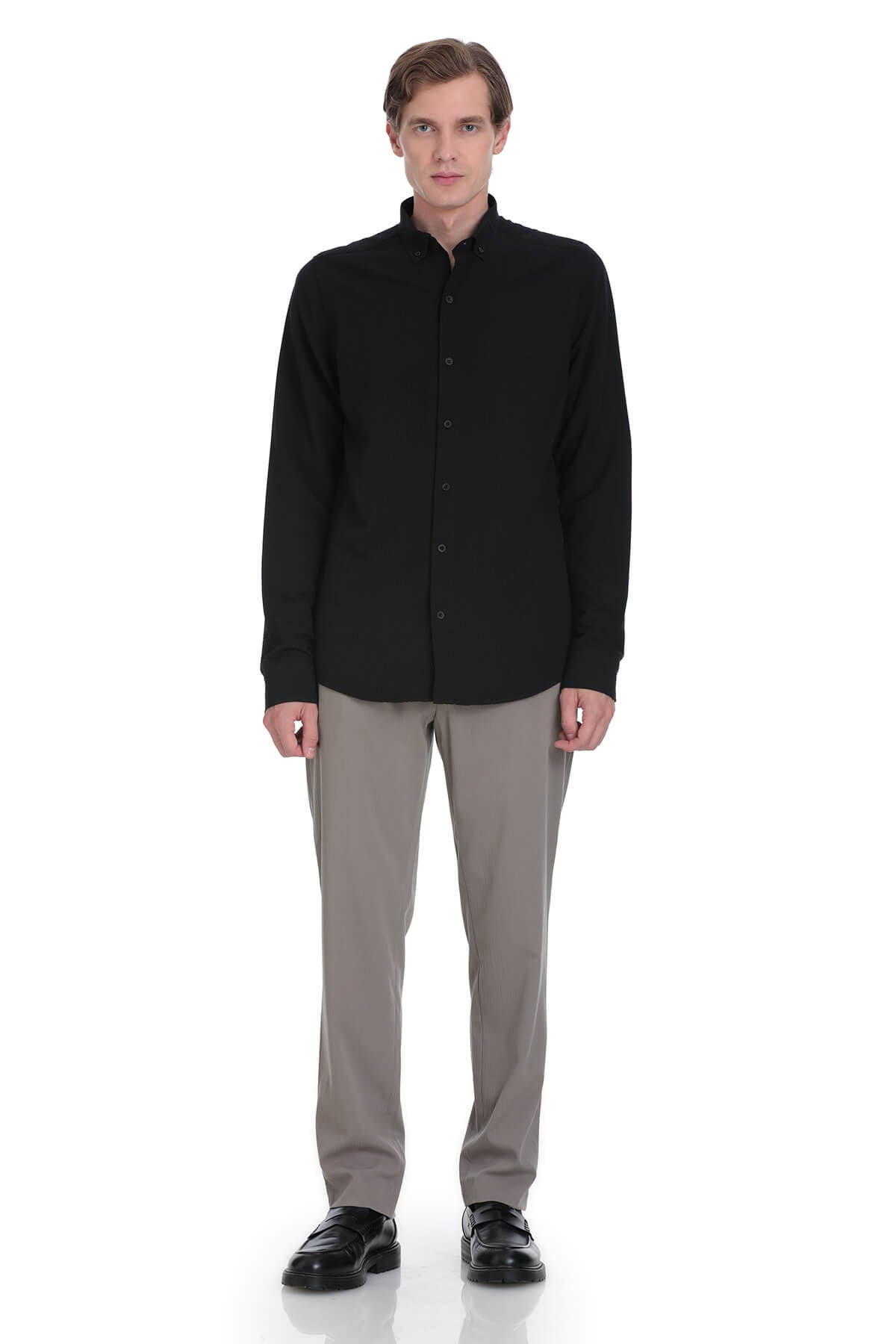 Black long-sleeved button-up shirt with a classic collar and neatly stitched seams.