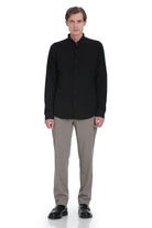Black long-sleeved button-up shirt with a classic collar and neatly stitched seams.
