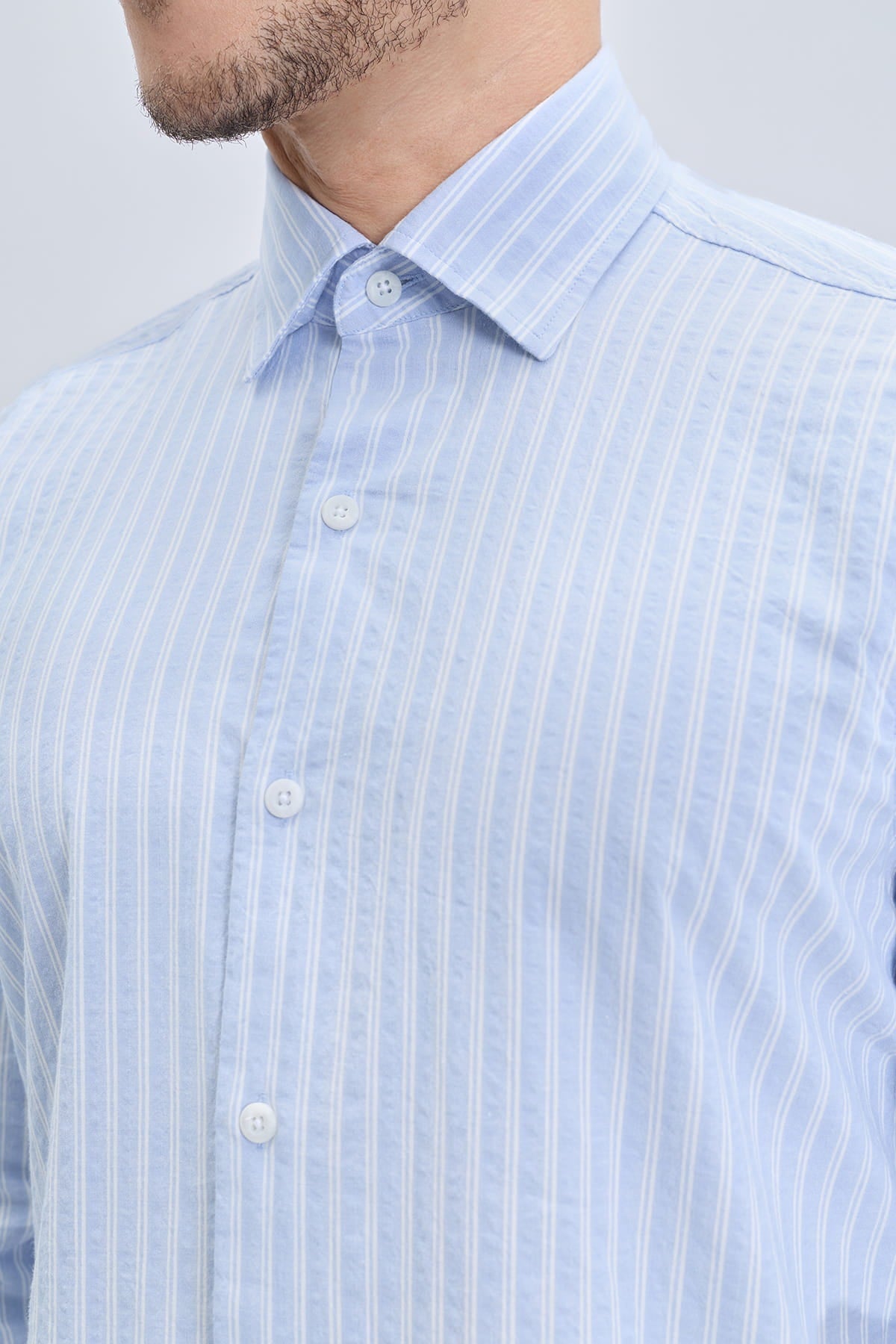 Comfort fit blue striped cotton casual shirt featuring light blue and white stripes with a classic collar for smart casual wear