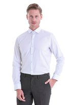 White long-sleeved dress shirt with subtle textured pattern.