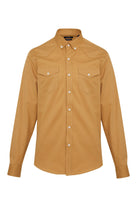 A tan button-down shirt with two chest pockets and white buttons.