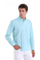 Light blue long-sleeved button-down shirt with a classic collar and neatly pressed fabric.