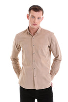 Beige long-sleeved button-down shirt with a chest pocket and subtle texture.