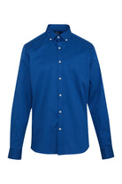 A crisp royal blue button-down shirt with white buttons and a classic collar.