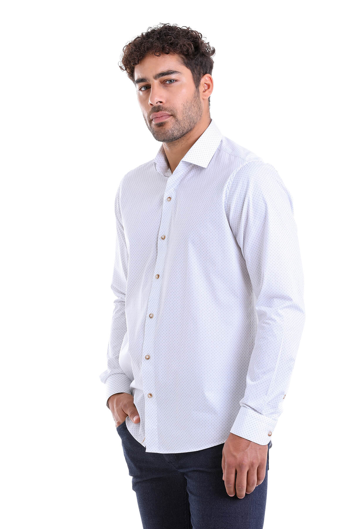 A crisp white men’s dress shirt with a subtle textured pattern and classic button-down collar.