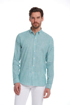 A men’s long-sleeved button-down shirt in a teal and white vertical striped pattern, made of lightweight fabric with neatly finished cuffs.