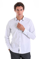 White men’s dress shirt with subtle vertical pinstripes and a classic collar.