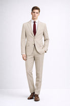 Beige two-piece comfort fit notch lapel suit with tailored fit, structured shoulders, and clean lines