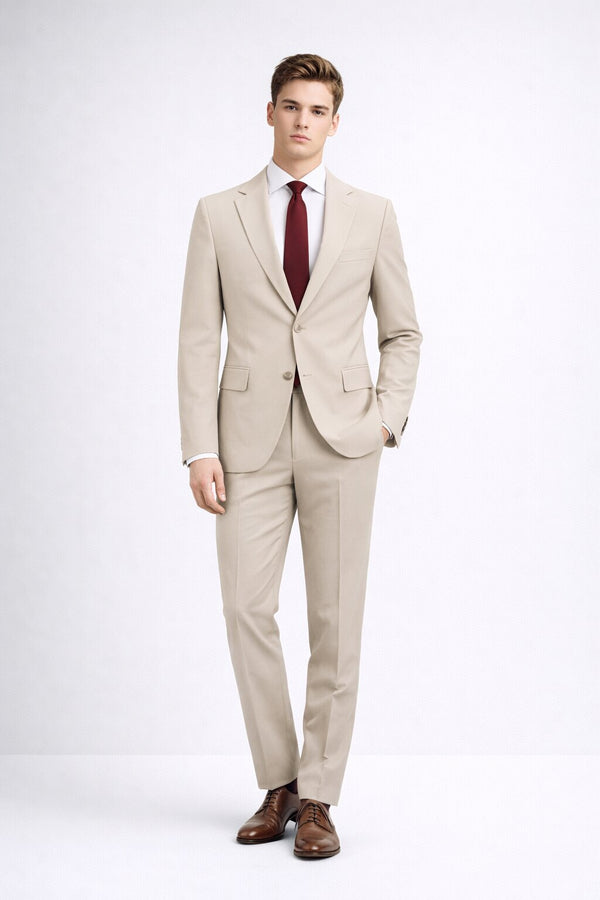 Beige two-piece comfort fit notch lapel suit with tailored fit, structured shoulders, and clean lines