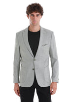 Light gray textured blazer with subtle pattern and two-button closure.