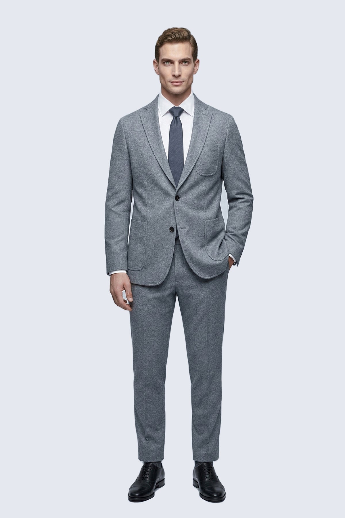 Gray textured wool suit with subtle pattern and two-button closure highlighting comfort fit notch lapel design