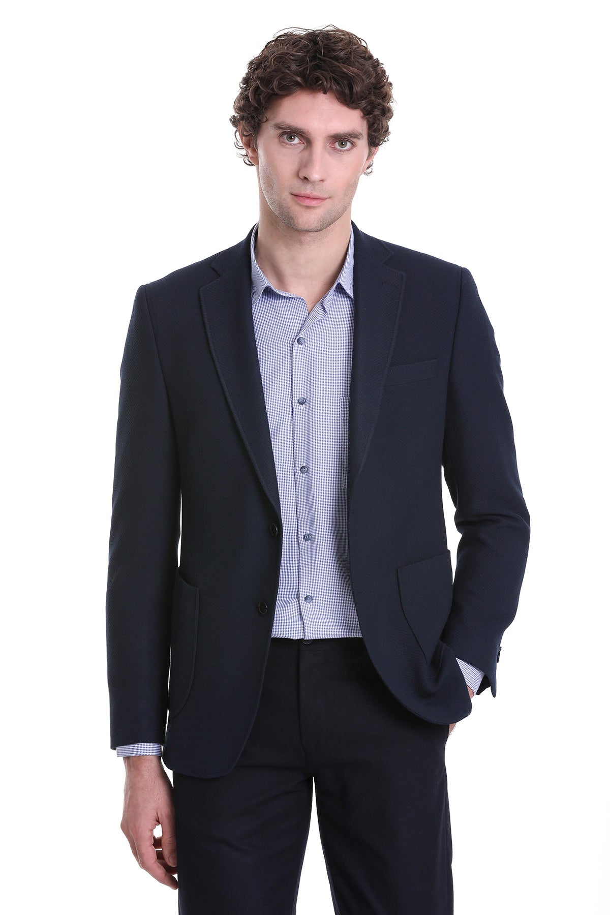 Dark navy blazer with a tailored fit and subtle texture, worn over a light blue checkered dress shirt.