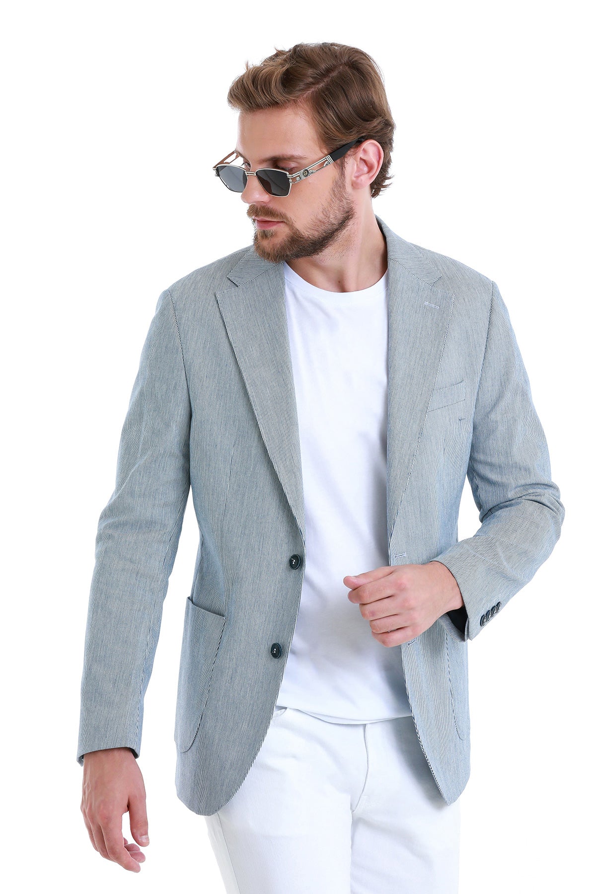 Light blue textured blazer with subtle pattern and black buttons.