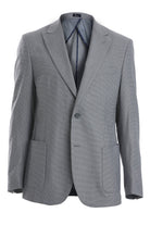 A tailored gray blazer with a subtle herringbone weave and notched lapels.