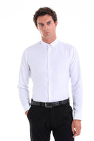 White long-sleeved men’s dress shirt with a classic collar and button-down front.