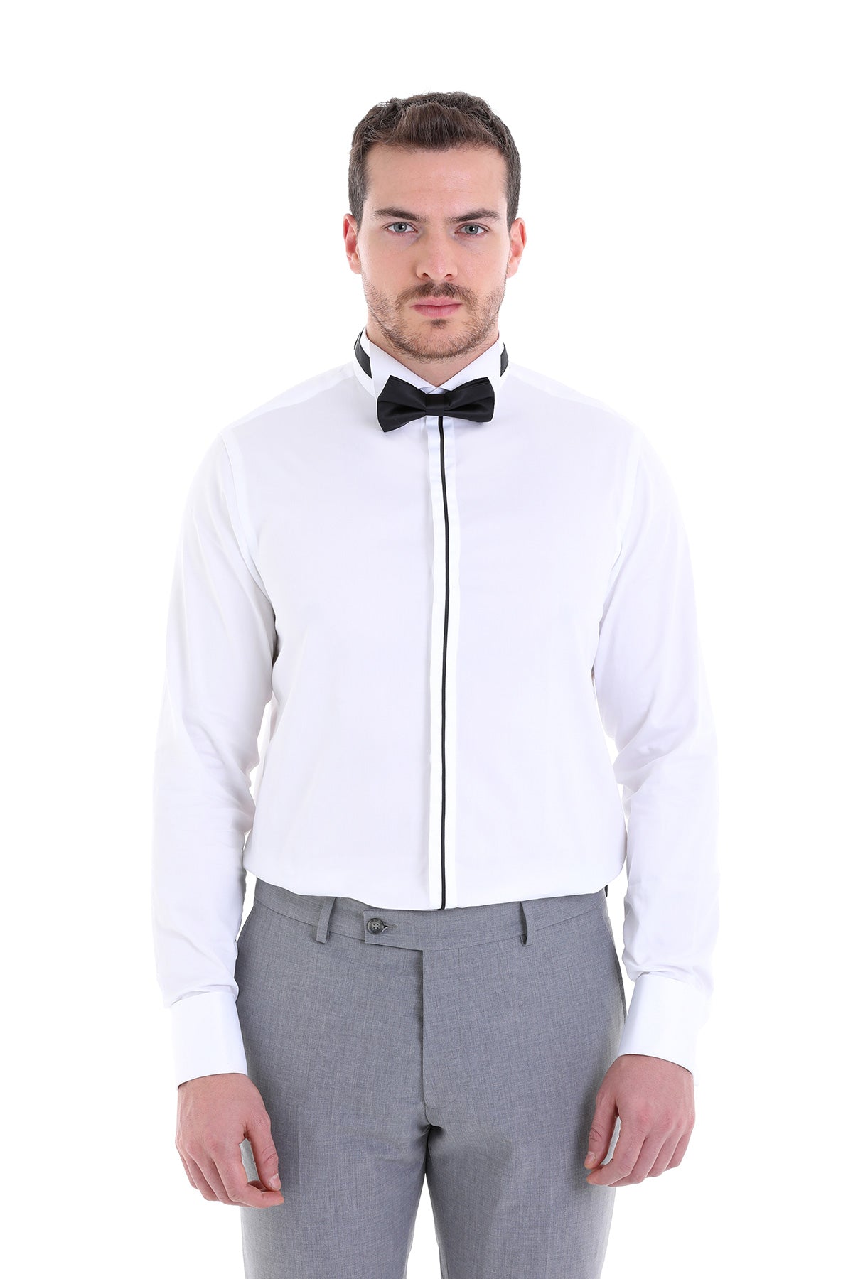 White formal shirt with black trim along the front placket and collar, paired with a matching black bow tie.