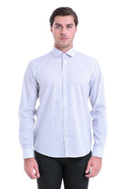 A light blue button-down shirt with a subtle pattern of small, evenly spaced dark dots across the fabric.