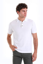 White short-sleeved polo shirt with a classic collar and black button placket.