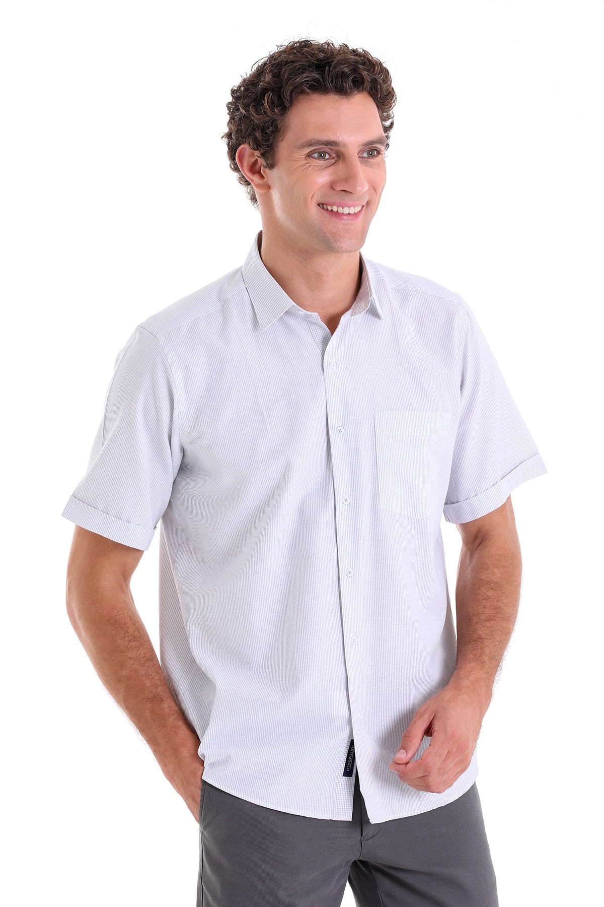 Light blue short-sleeved button-down shirt with subtle vertical stripes.