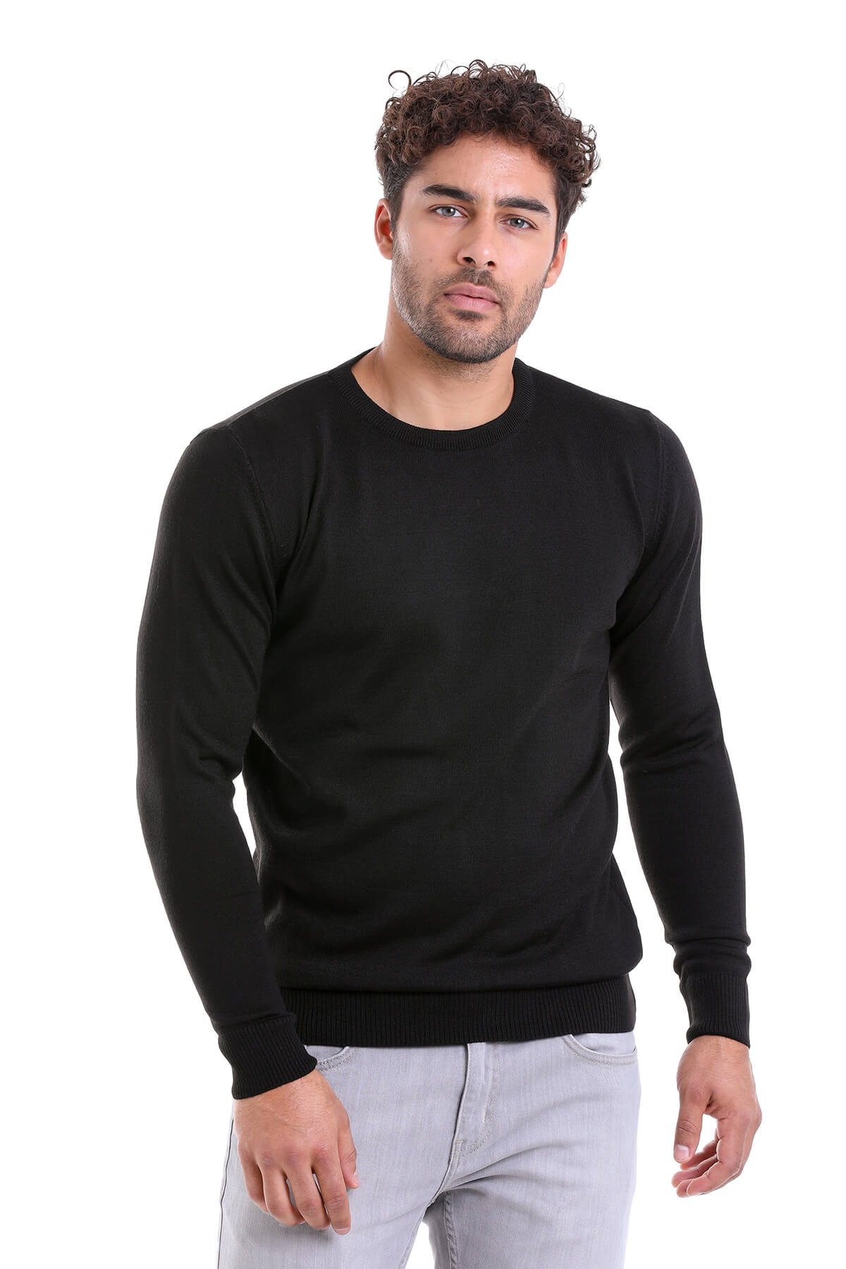 Black long-sleeved crew neck sweater.