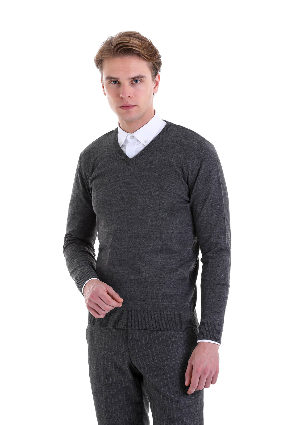 Dark gray v-neck sweater with a subtle textured knit and ribbed cuffs.