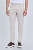 Beige straight-leg linen-tone chino pants with dynamic fit pocket low waist and smart casual modern cut and stitching details