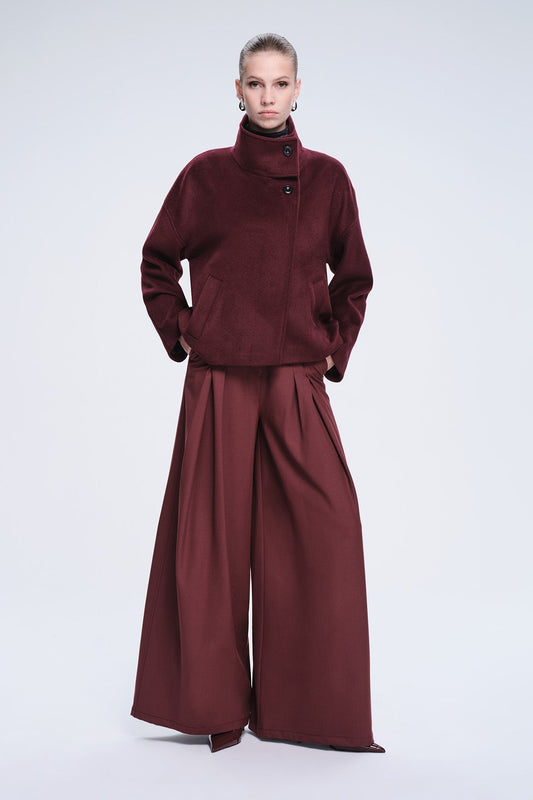A rich burgundy woolen coat with a high collar and black buttons.