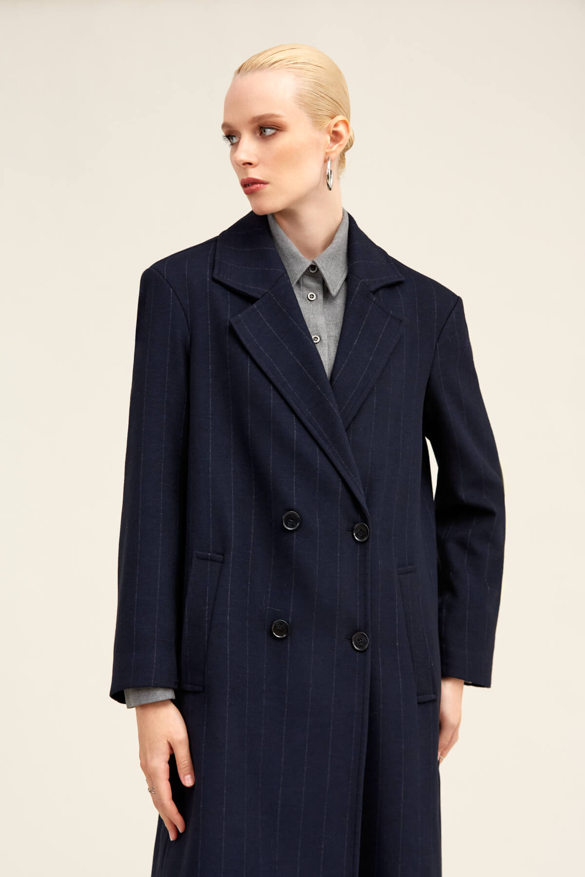 Navy blue pinstripe double-breasted coat