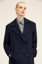 Navy blue pinstripe double-breasted coat
