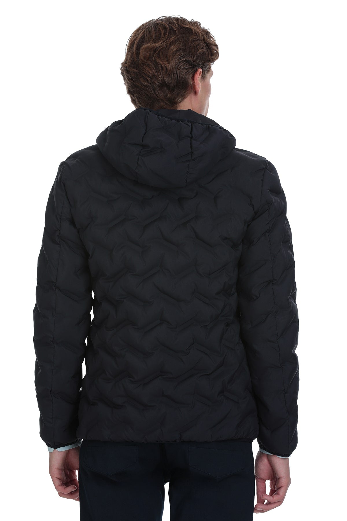Black quilted puffer jacket with a hood and subtle wave-pattern stitching.