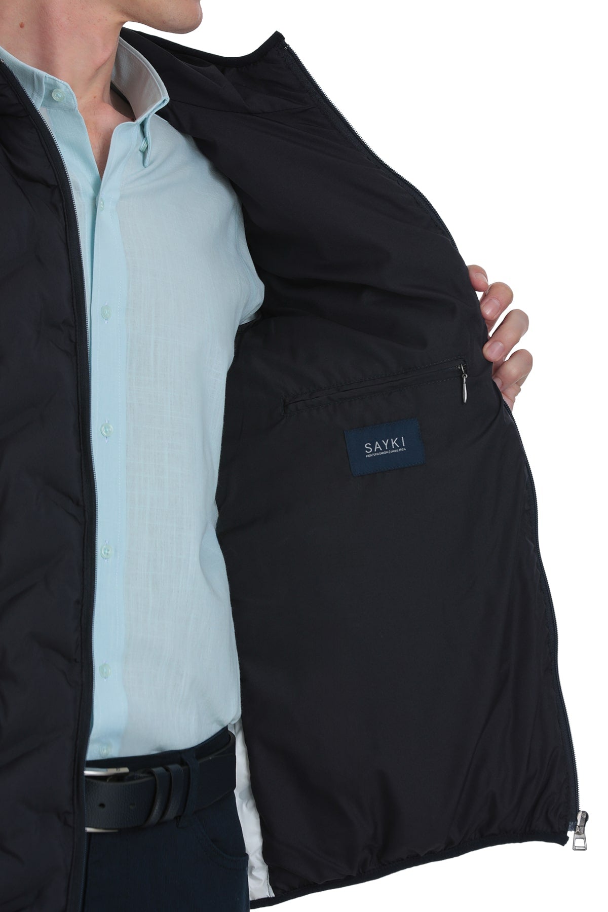 Black sayki jacket with a sleek, modern design and subtle stitching details.