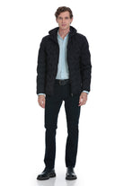 Black quilted puffer jacket with a hood and front zipper.