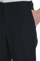 Black tailored trousers with a sleek structured fit and subtle pleats perfect for smart casual dynamic fit navy styles