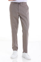 Beige chino trousers with a drawstring waistband and clean, straight-leg cut.