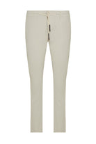Beige tapered trousers with a drawstring waistband and black metal hardware.