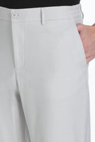 Light gray textured dynamic fit stone linen blend jogger pants with subtle pattern and matching button closure
